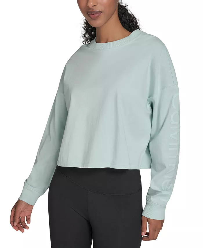 Женская укороченная футболка с длинным рукавом и логотипом Performance Calvin Klein, синий
Женская укороченная футболка с длинным рукавом и логотипом Performance Calvin Klein, синий