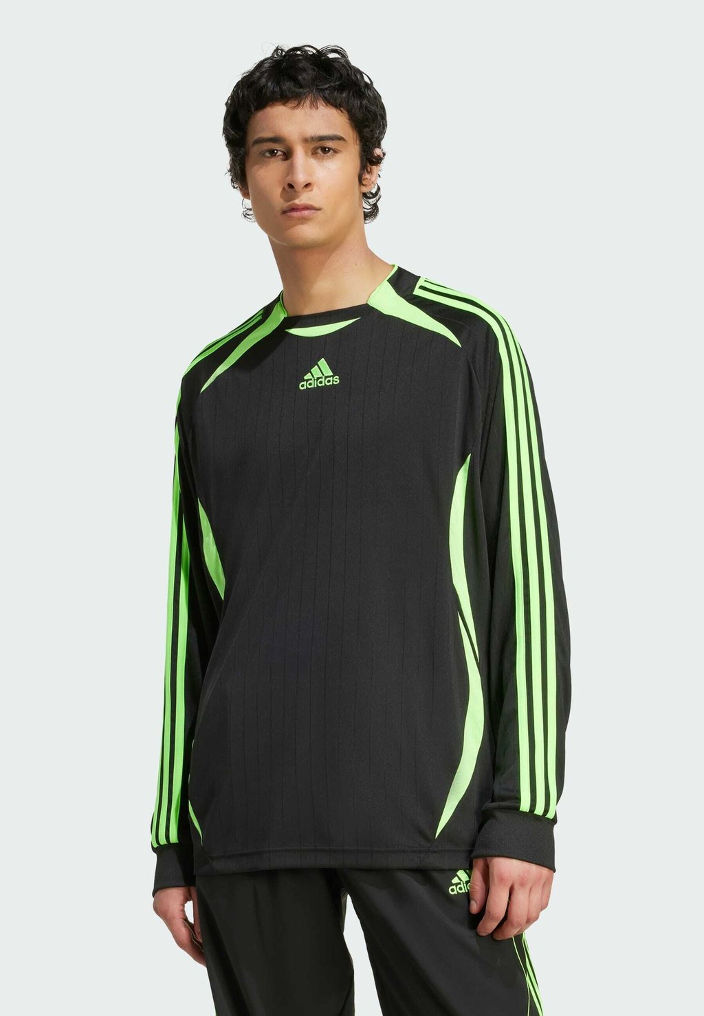 Лонгслив TEAM GEIST UNISEX Adidas Originals, черный 
Лонгслив TEAM GEIST UNISEX Adidas Originals, черный