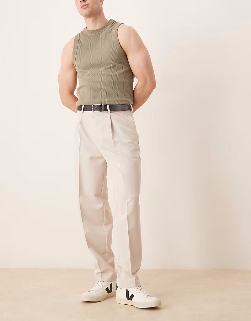 ASOS DESIGN элегантные зауженные брюки свободного кроя со складкой спереди в цвете экрю
ASOS DESIGN элегантные зауженные брюки свободного кроя со складкой спереди в цвете экрю