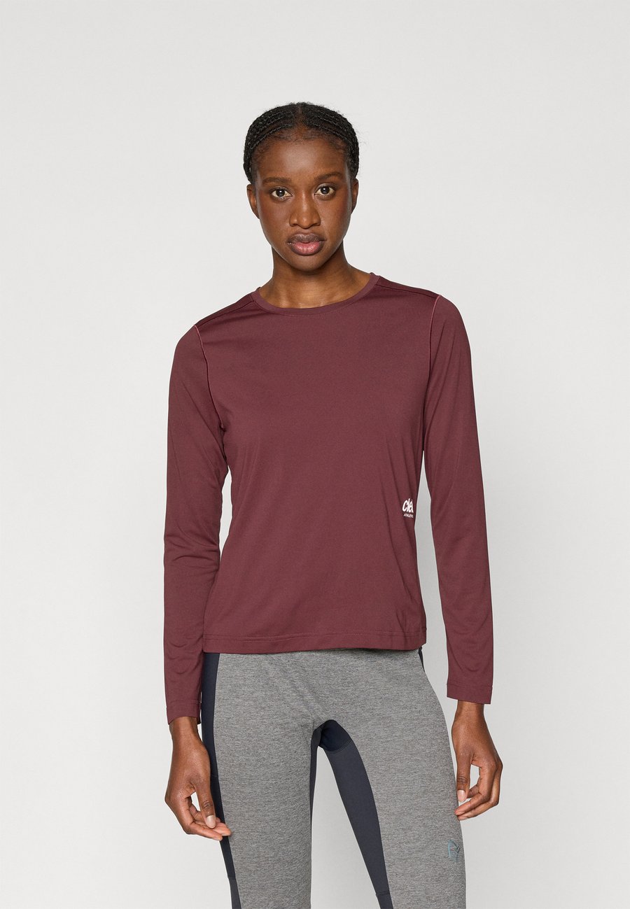 Топ Ciele DLYLONGSLEEVE, Darkwine Red/Dark Red
Топ Ciele DLYLONGSLEEVE, Darkwine Red/Dark Red