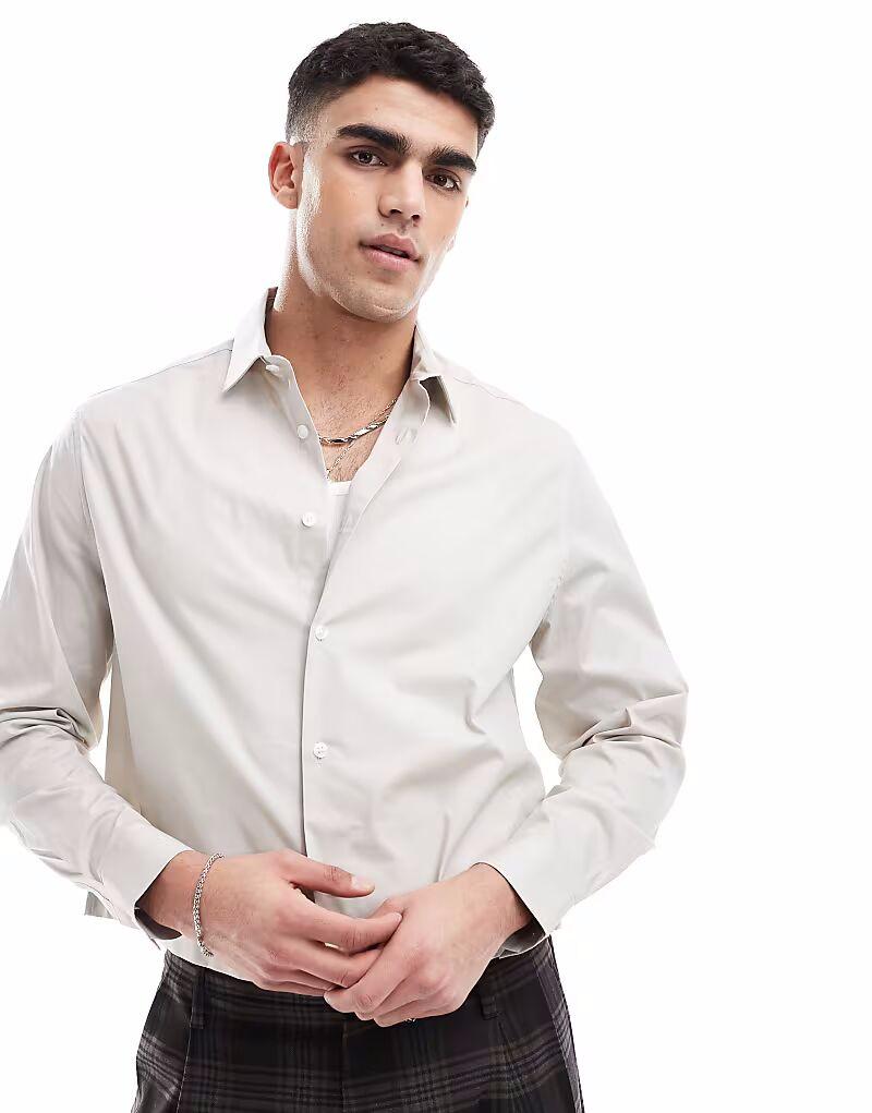 Рубашка ASOS DESIGN из поплина, классического кроя, с французской планкой, песочного цвета
Рубашка ASOS DESIGN из поплина, классического кроя, с французской планкой, песочного цвета