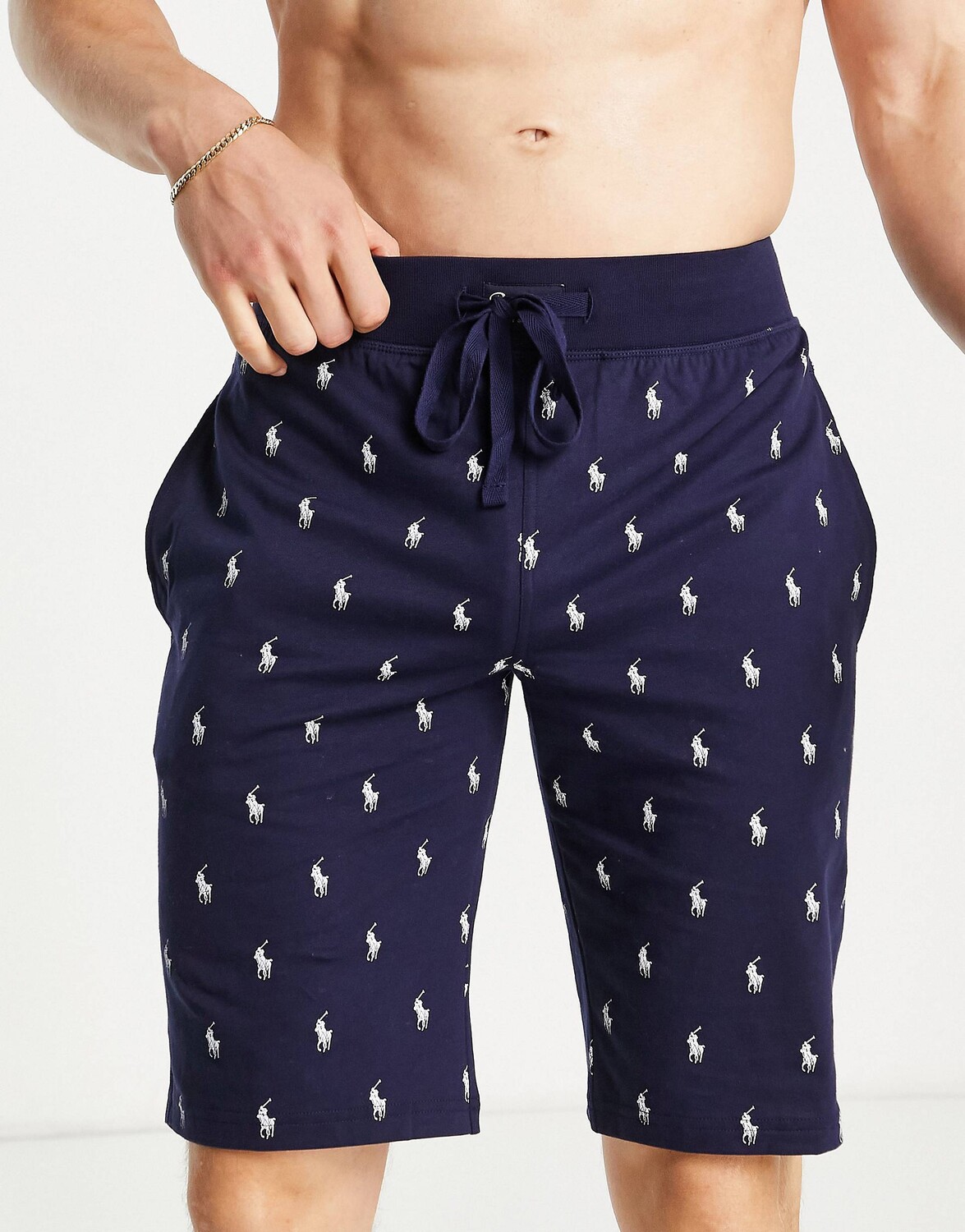 Темно-синие шорты для отдыха Polo Ralph Lauren с принтом логотипа по всей поверхности
Темно-синие шорты для отдыха Polo Ralph Lauren с принтом логотипа по всей поверхности