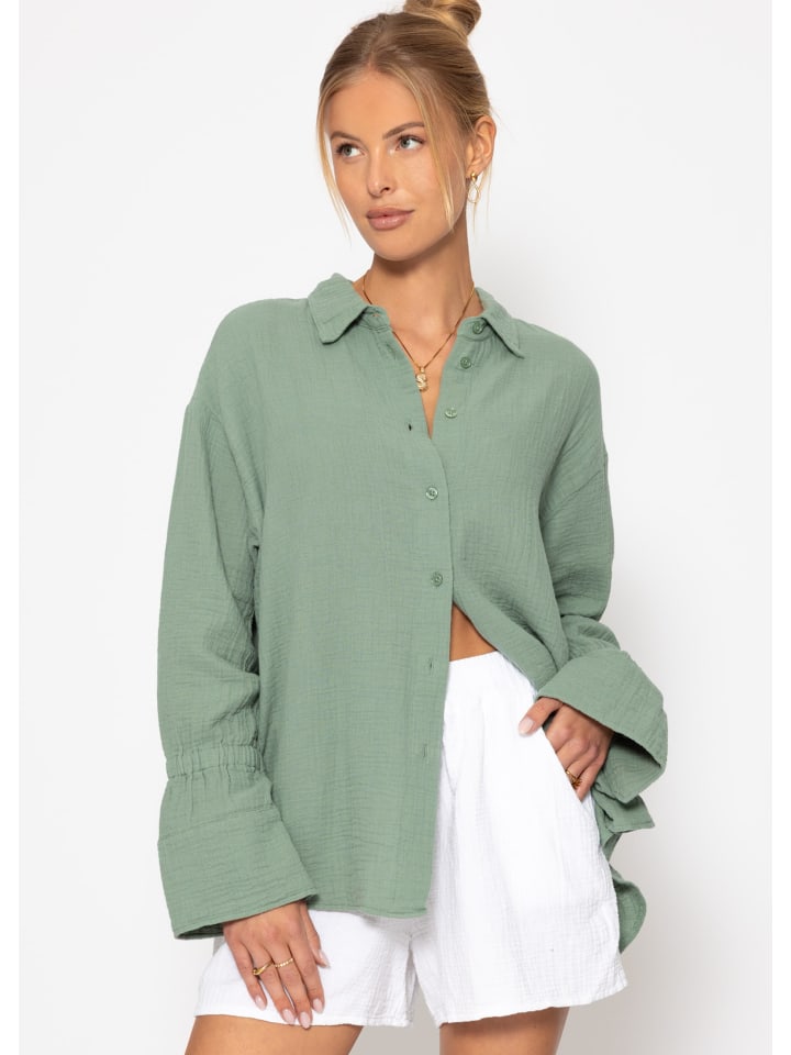 Муслиновая блузка с широкими манжетами зеленого цвета SASSYCLASSY
Муслиновая блузка с широкими манжетами зеленого цвета SASSYCLASSY