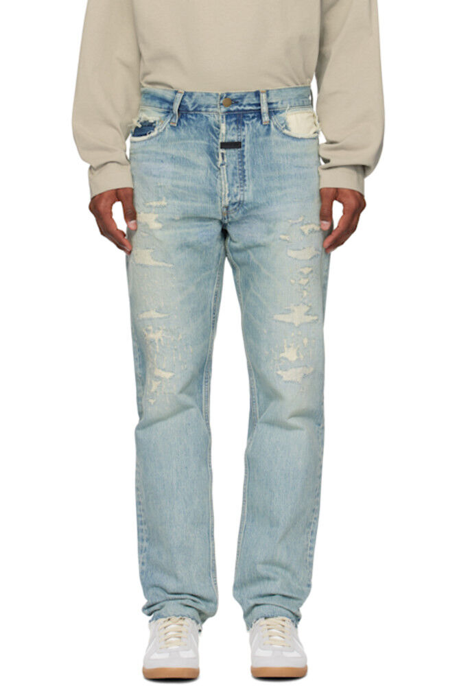 Синие отремонтированные классические джинсы с пятью карманами Fear of God
Синие отремонтированные классические джинсы с пятью карманами Fear of God