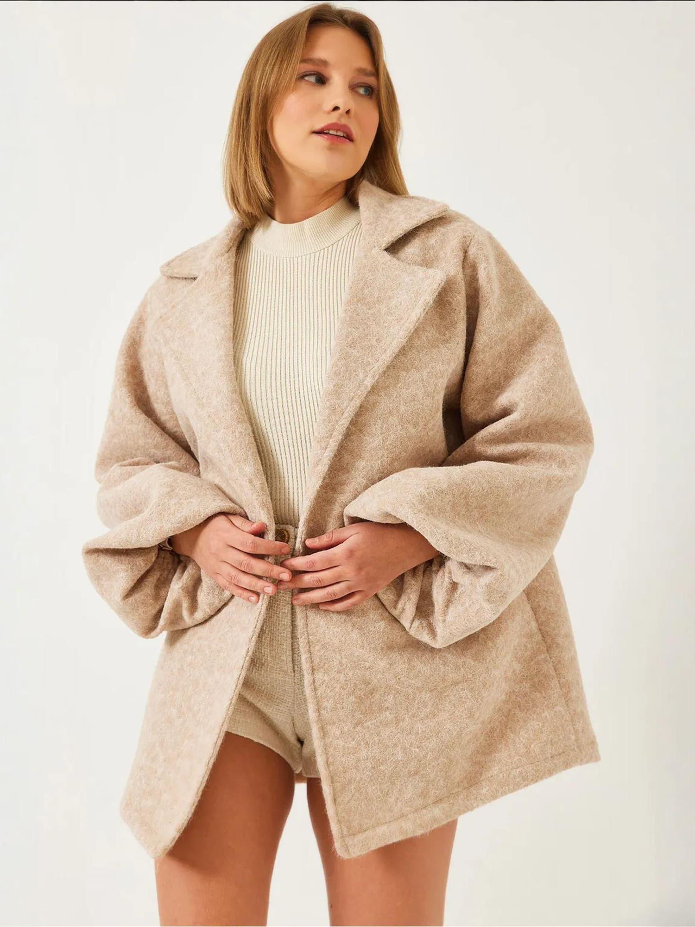 Bianco Lucci Зимнее пальто в крапчатом бежевом цвете
Bianco Lucci Зимнее пальто в крапчатом бежевом цвете