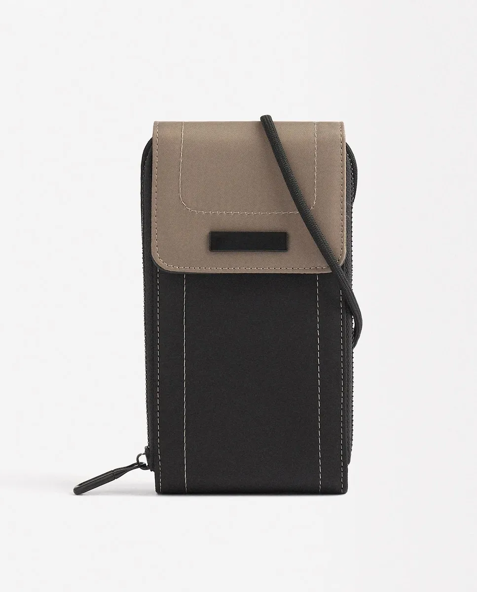 Сумка для мобильного телефона, преобразуемая в сумку через плечо с клапаном и магнитной застежкой Parfois, черный/бежевый
Сумка для мобильного телефона, преобразуемая в сумку через плечо с клапаном и магнитной застежкой Parfois, черный/бежевый