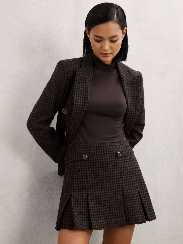 Мини-юбка Elle в складку с клетчатым принтом Reiss
Мини-юбка Elle в складку с клетчатым принтом Reiss