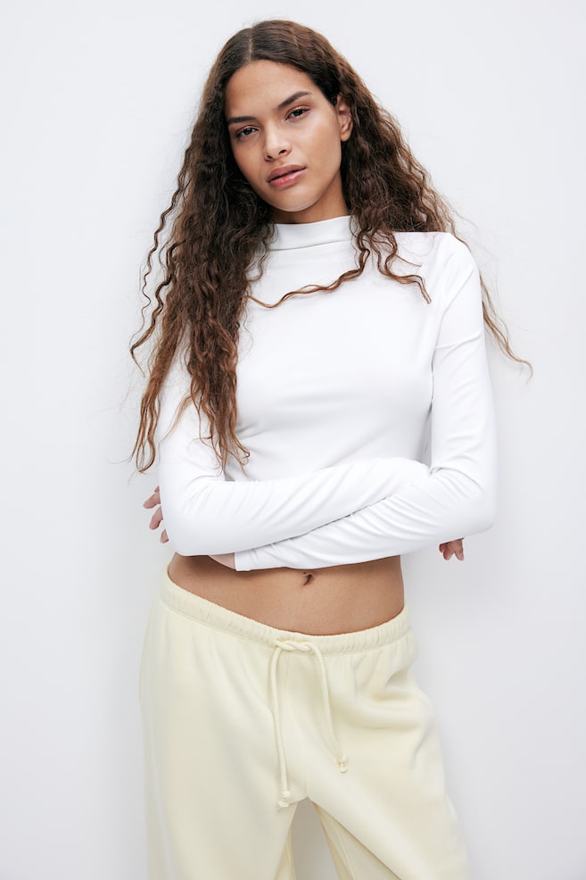 Рубашка с высоким воротом H&M, бежевый
Рубашка с высоким воротом H&M, бежевый