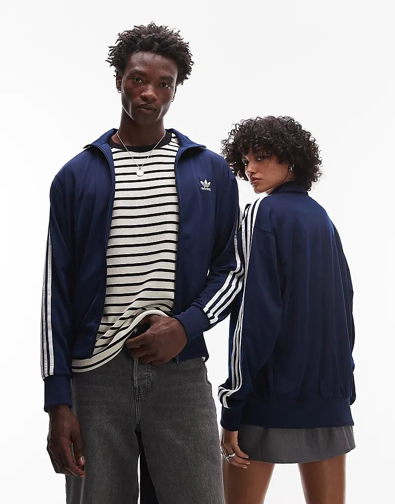 Спортивный топ adidas Originals Firebird темно-синего цвета
Спортивный топ adidas Originals Firebird темно-синего цвета