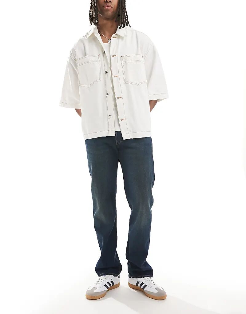 Джинсы Levi's 501 Original прямого кроя темного цвета
Джинсы Levi's 501 Original прямого кроя темного цвета