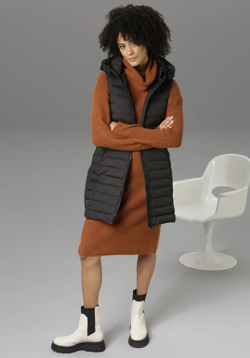 Стеганый жилет Aniston CASUAL с регулируемым капюшоном, черный
Стеганый жилет Aniston CASUAL с регулируемым капюшоном, черный