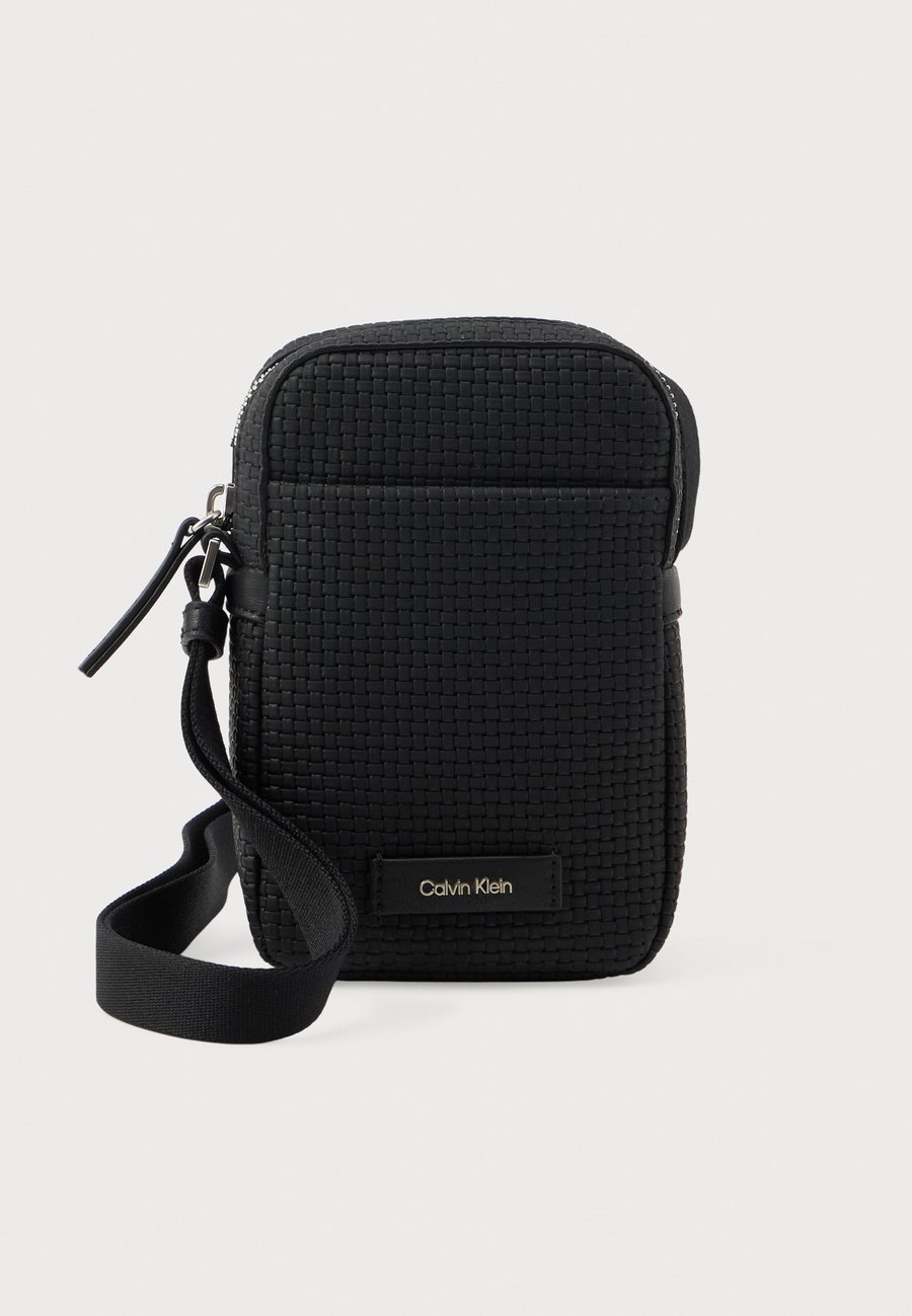 Сумка кросс-боди Calvin Klein SLIM REPORTER, Black
Сумка кросс-боди Calvin Klein SLIM REPORTER, Black