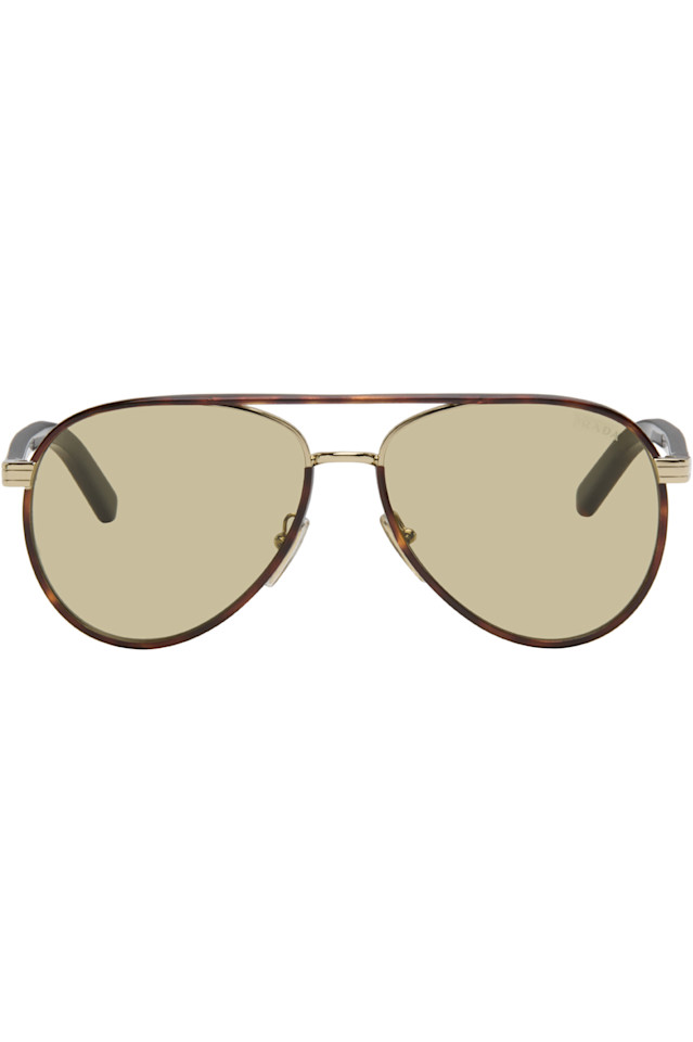 Prada Eyewear Коричневые солнцезащитные очки с металлической пластиной, ставшие культовыми
Prada Eyewear Коричневые солнцезащитные очки с металлической пластиной, ставшие культовыми