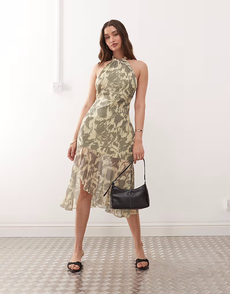 Платье мидакси Motel Tanta с бретелью через шею и размытым цветочным принтом желтого цвета
Платье мидакси Motel Tanta с бретелью через шею и размытым цветочным принтом желтого цвета