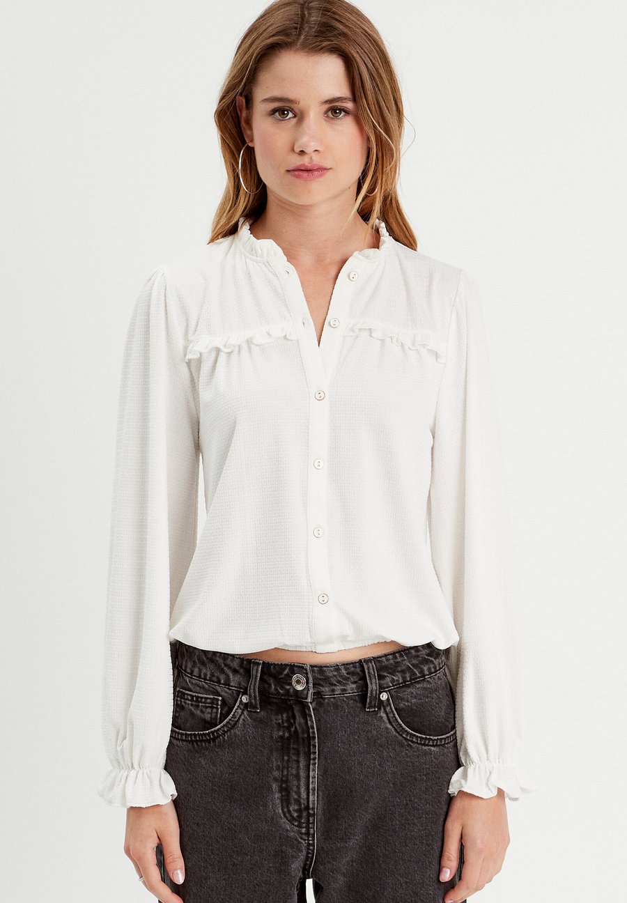 Блуза Cache Cache MIT VOLANTDETAILS, Ecru/Off-White
Блуза Cache Cache MIT VOLANTDETAILS, Ecru/Off-White