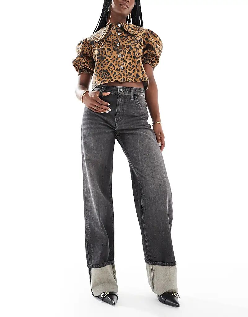 Подвернутые широкие джинсы грязно-выстиранного черного цвета Bershka
Подвернутые широкие джинсы грязно-выстиранного черного цвета Bershka