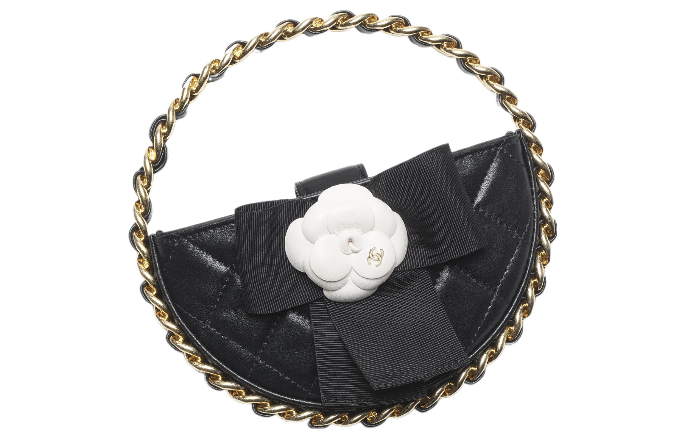 CHANEL Черная женская сумка-клатч круглая из овчины с кожаной отделкой
CHANEL Черная женская сумка-клатч круглая из овчины с кожаной отделкой