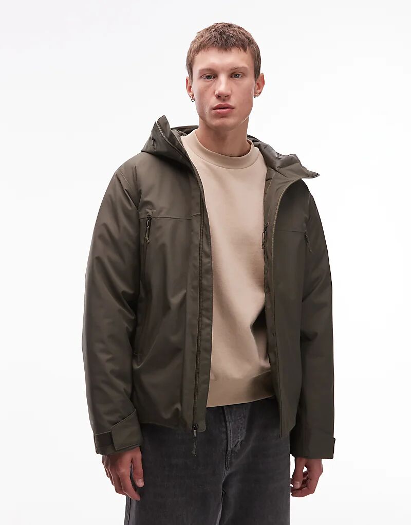 Водонепроницаемая утепленная куртка North Face MTN Range с капюшоном темно-зеленого цвета
Водонепроницаемая утепленная куртка North Face MTN Range с капюшоном темно-зеленого цвета