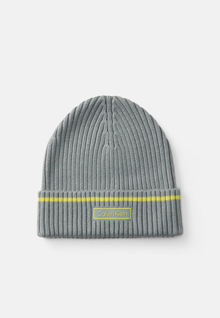 Шапка Calvin Klein PATCH CHUNKY UNISEX, Stormy Sea/Fragile Sprout/Blue-Grey
Шапка Calvin Klein PATCH CHUNKY UNISEX, Stormy Sea/Fragile Sprout/Blue-Grey