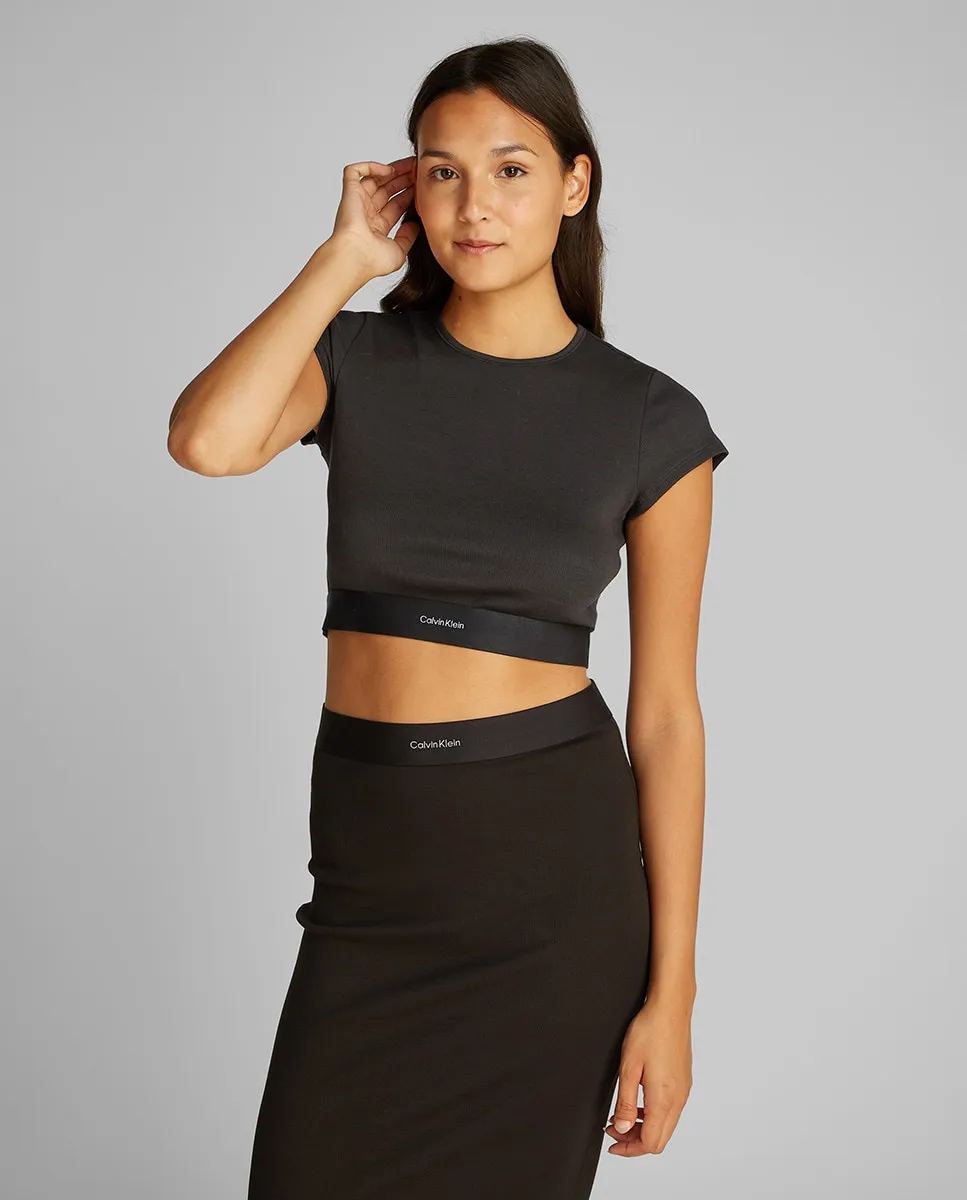 Укороченный топ из эластичного хлопкового рубчика Calvin Klein, черный
Укороченный топ из эластичного хлопкового рубчика Calvin Klein, черный