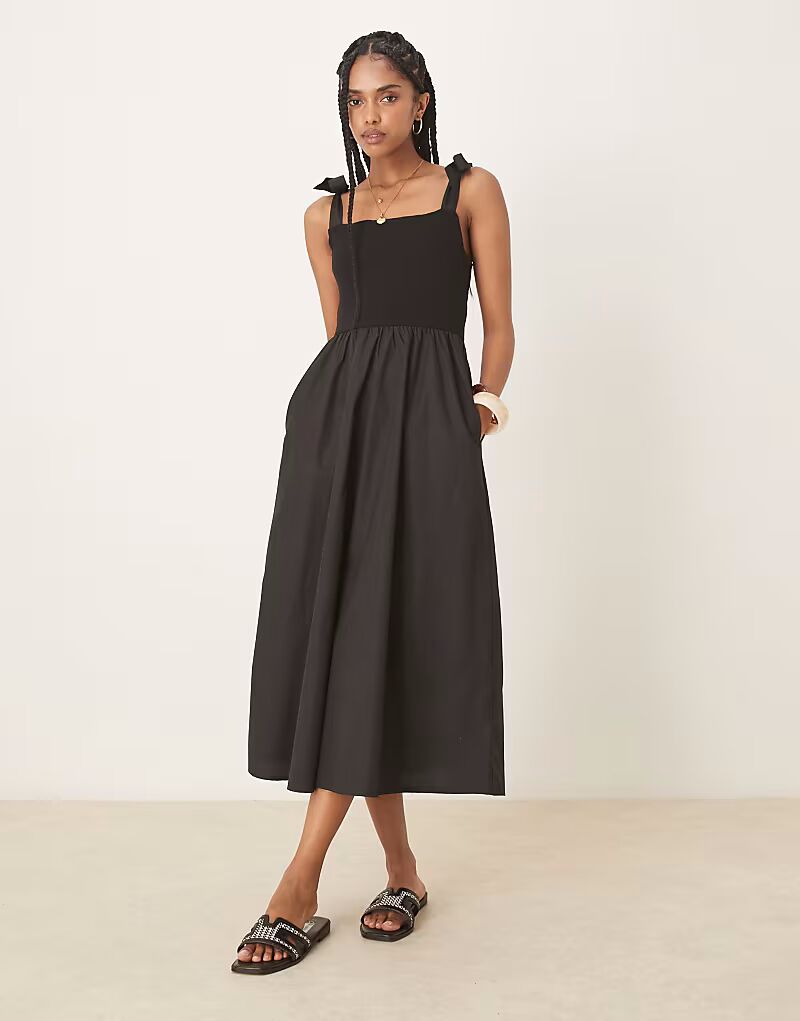 Платье миди из потертого джерси с завязками черного цвета Threadbare
Платье миди из потертого джерси с завязками черного цвета Threadbare