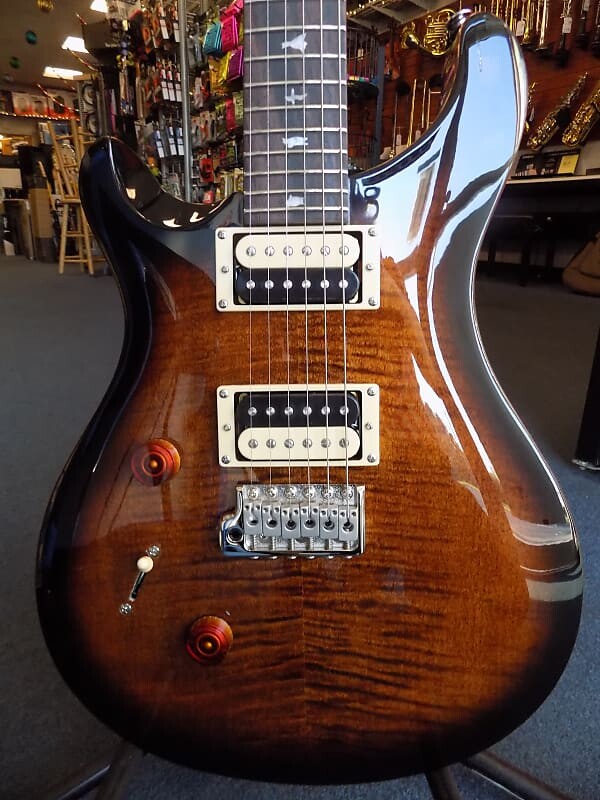 Электрогитара Paul Reed Smith SE Lefty Custom 24 CU4L с сумкой для переноски - Black Gold Sunburst PRS
Электрогитара Paul Reed Smith SE Lefty Custom 24 CU4L с сумкой для переноски - Black Gold Sunburst PRS