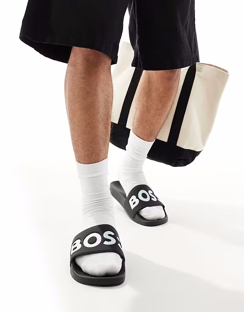 Шлепанцы для бассейна с логотипом BOSS Aryeh в черно-белом цвете BOSS Orange
Шлепанцы для бассейна с логотипом BOSS Aryeh в черно-белом цвете BOSS Orange