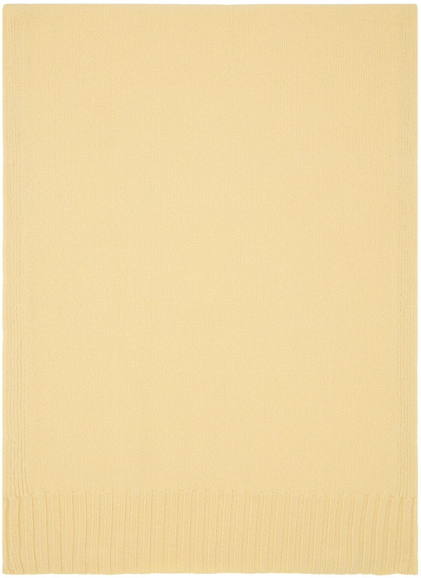 Желтый шарф с нашивками Jil Sander
Желтый шарф с нашивками Jil Sander