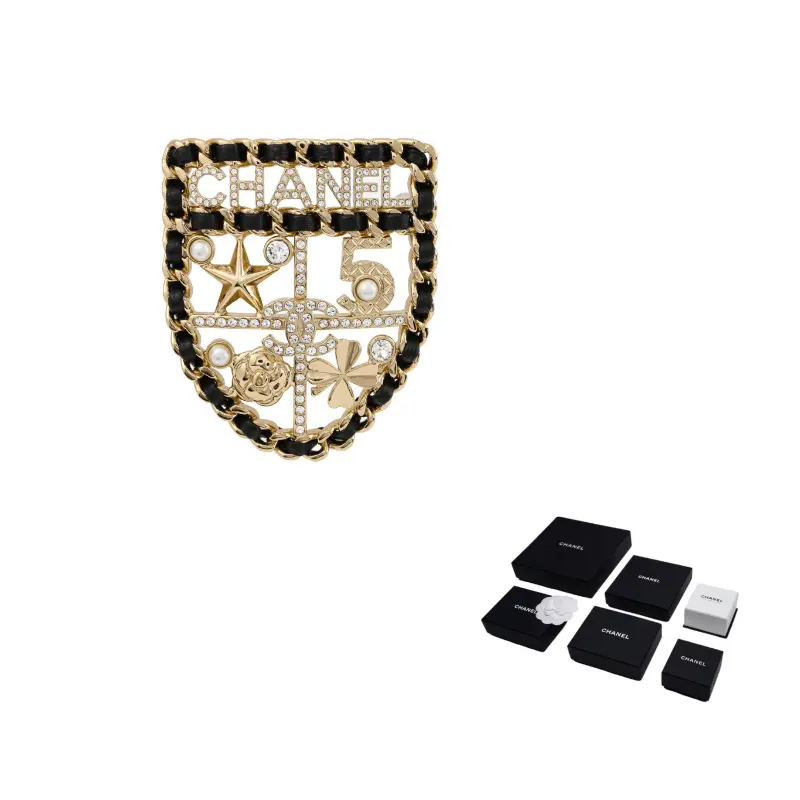 Брошь со стразами для женщин CHANEL
Брошь со стразами для женщин CHANEL