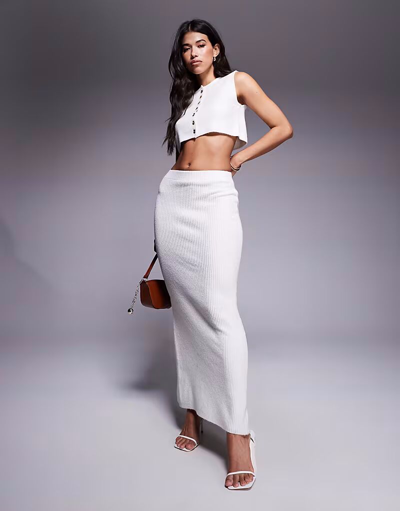 Юбка макси с разрезом на спине, ребристая, кремового цвета Aria Cove
Юбка макси с разрезом на спине, ребристая, кремового цвета Aria Cove