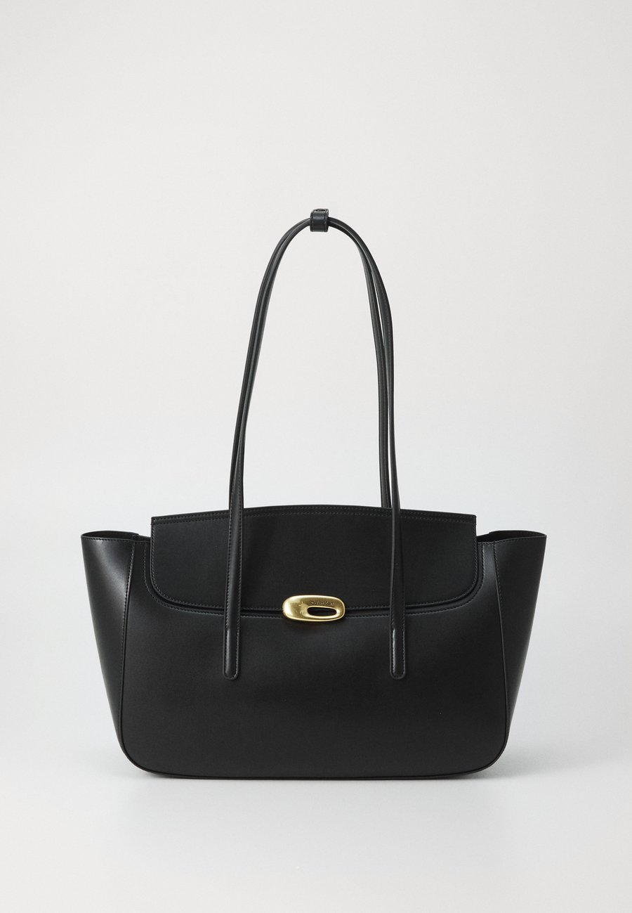 Сумка Calvin Klein ENGRAVED, Black/ Tumbled Deep Gold-Coloured/Black
Сумка Calvin Klein ENGRAVED, Black/ Tumbled Deep Gold-Coloured/Black