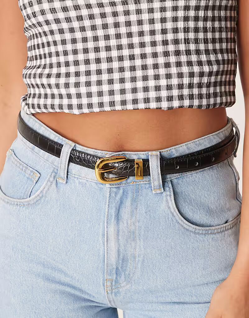 Узкий пояс для джинсов ASOS DESIGN с металлическим фиксатором и черной крокодиловой кожей
Узкий пояс для джинсов ASOS DESIGN с металлическим фиксатором и черной крокодиловой кожей