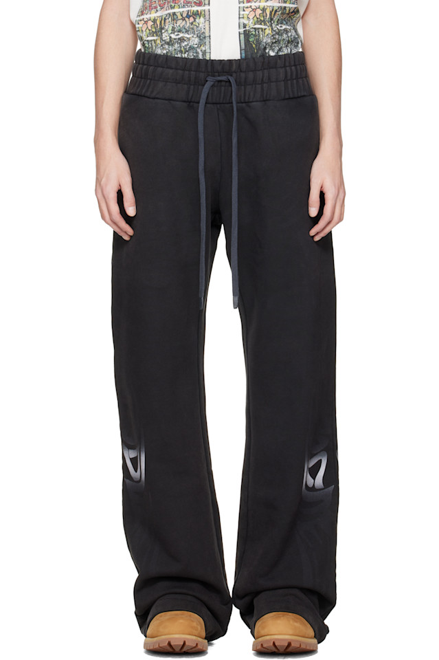 Who Decides War Черные спортивные штаны с крыльями
Who Decides War Черные спортивные штаны с крыльями