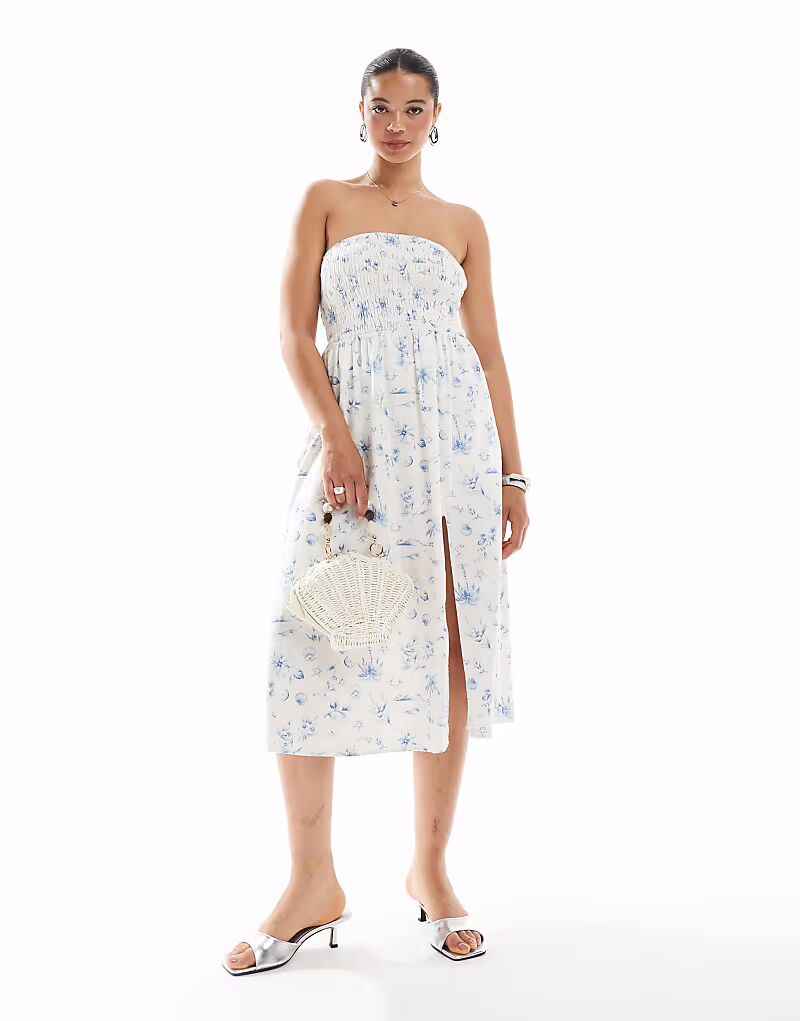 Платье миди Hollister без бретелек с заниженной талией и вставками в синем цветочном узоре
Платье миди Hollister без бретелек с заниженной талией и вставками в синем цветочном узоре