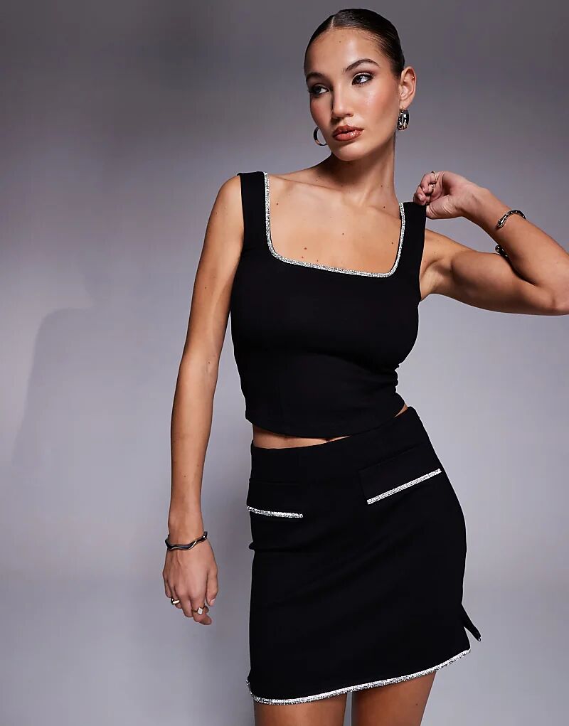 Топ-майка ASOS DESIGN Coord с отделкой стразами черного цвета
Топ-майка ASOS DESIGN Coord с отделкой стразами черного цвета