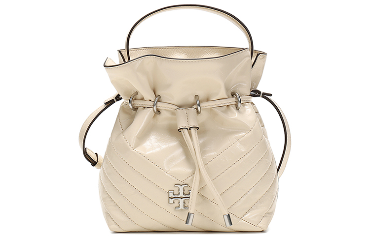 Кожаная сумка-ведро Kira через плечо мини женская экрю TORY BURCH
Кожаная сумка-ведро Kira через плечо мини женская экрю TORY BURCH