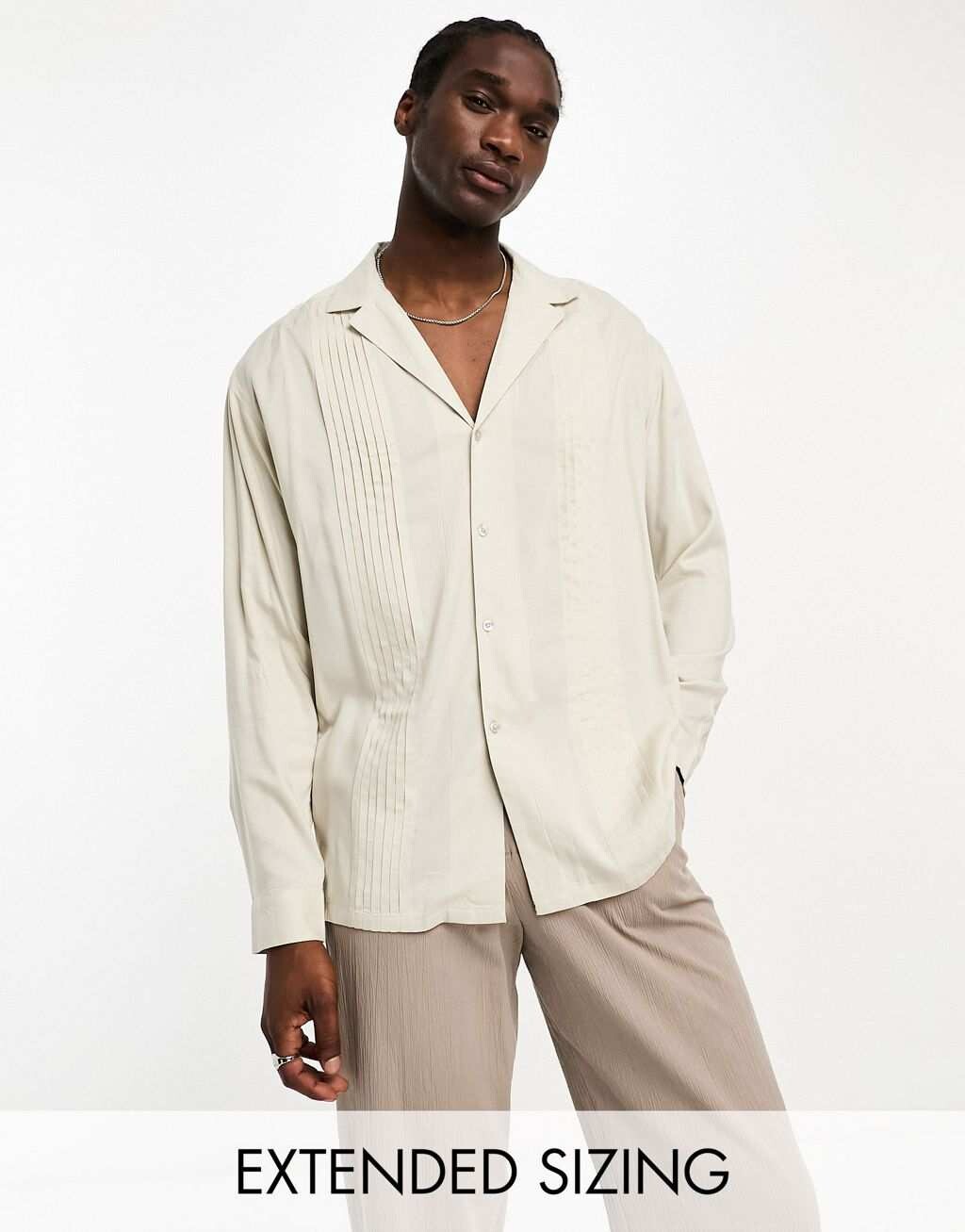 ASOS DESIGN Объемная рубашка из вискозы в стиле 90-х годов с каменной складкой спереди
ASOS DESIGN Объемная рубашка из вискозы в стиле 90-х годов с каменной складкой спереди