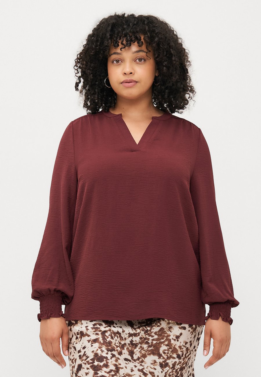 Блуза ONLY Carmakoma CARMETTA LIFE V NECK, Tawny Port/Bordeaux
Блуза ONLY Carmakoma CARMETTA LIFE V NECK, Tawny Port/Bordeaux