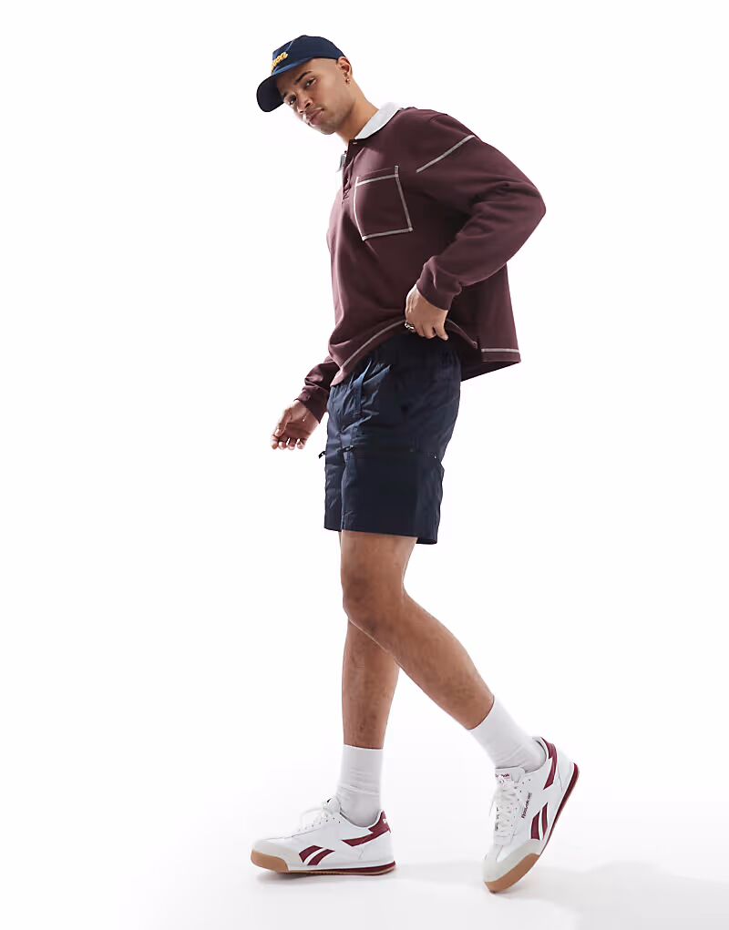 BOSS Orange Sal tab belt нейлоновые технические шорты карго темно-синего цвета
BOSS Orange Sal tab belt нейлоновые технические шорты карго темно-синего цвета