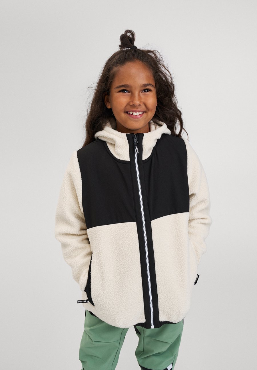 Флисовая куртка Reima TURBO UNISEX, Light Beige/Beige
Флисовая куртка Reima TURBO UNISEX, Light Beige/Beige