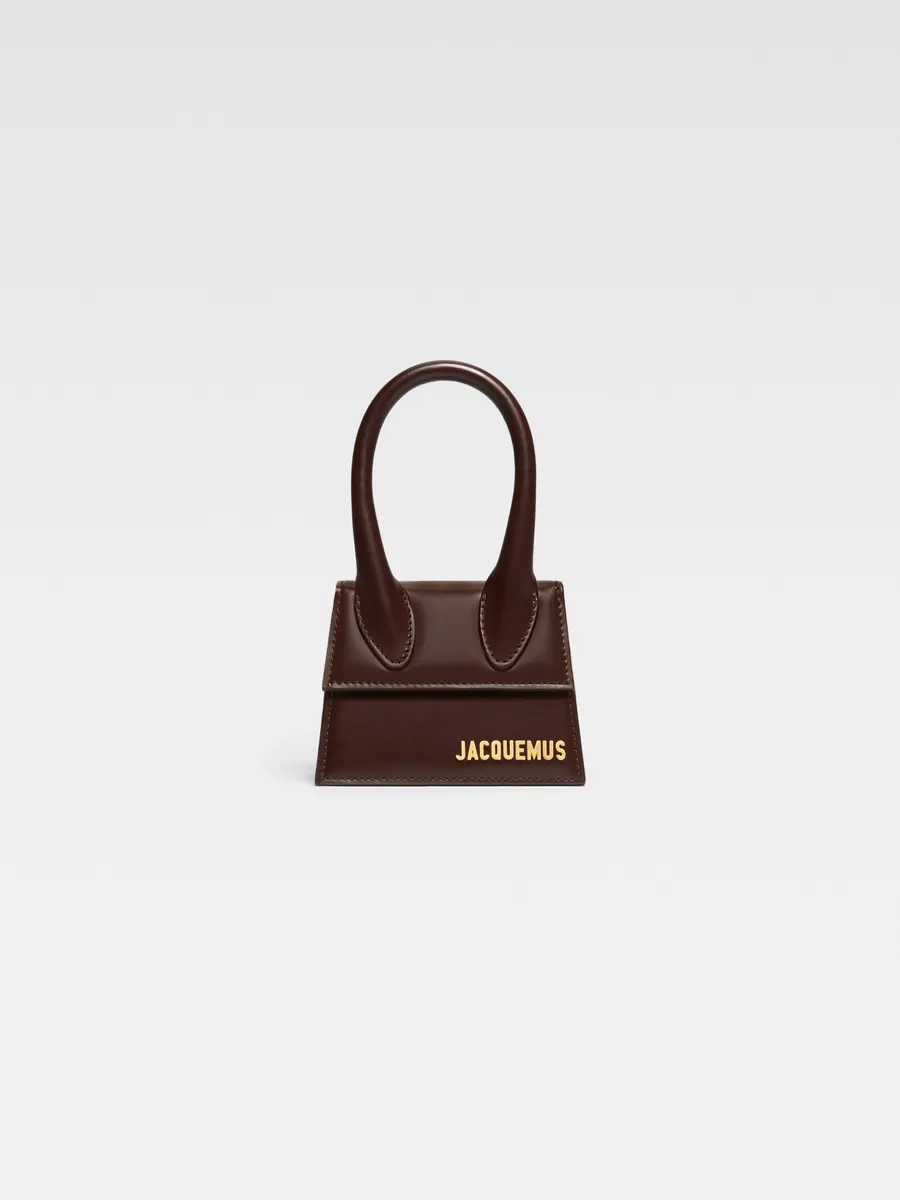 Фирменная кожаная мини-сумочка Ле Чикито Jacquemus, коричневый
Фирменная кожаная мини-сумочка Ле Чикито Jacquemus, коричневый