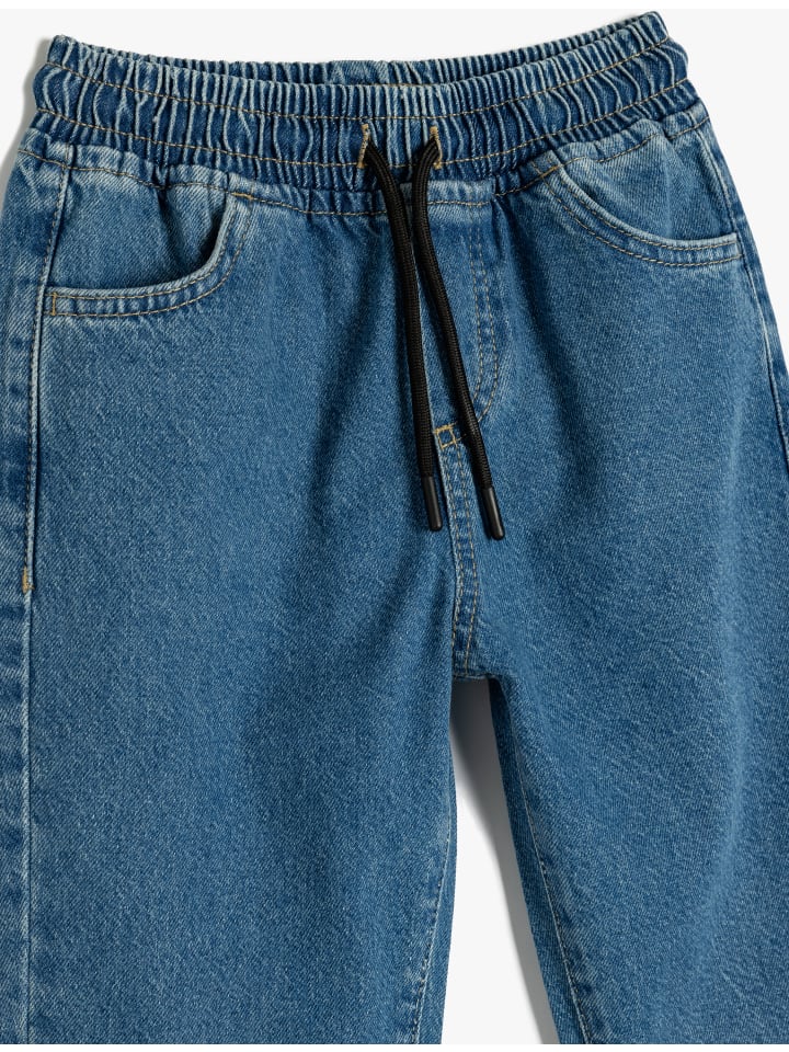 Джинсы цвета темного индиго KOTON
Джинсы цвета темного индиго KOTON