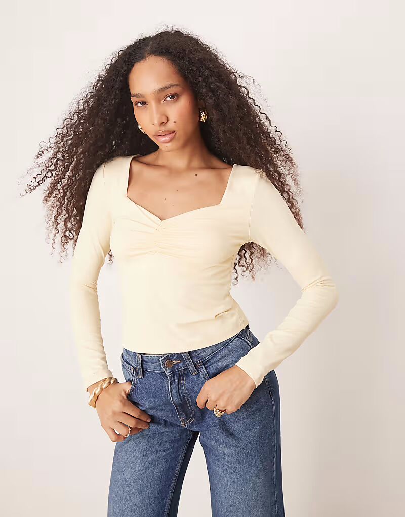 Облегающий топ из полиамида с длинными рукавами и сборкой на груди ASOS DESIGN пастельно-желтого цвета
Облегающий топ из полиамида с длинными рукавами и сборкой на груди ASOS DESIGN пастельно-желтого цвета