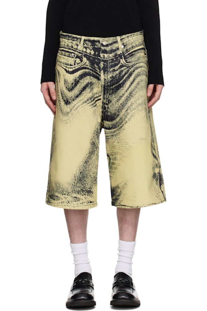 Желтые и черные шорты из денима с искажениями CAMPERLAB
Желтые и черные шорты из денима с искажениями CAMPERLAB