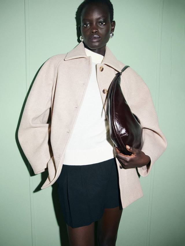 Нефритовое короткое пальто Mango
Нефритовое короткое пальто Mango