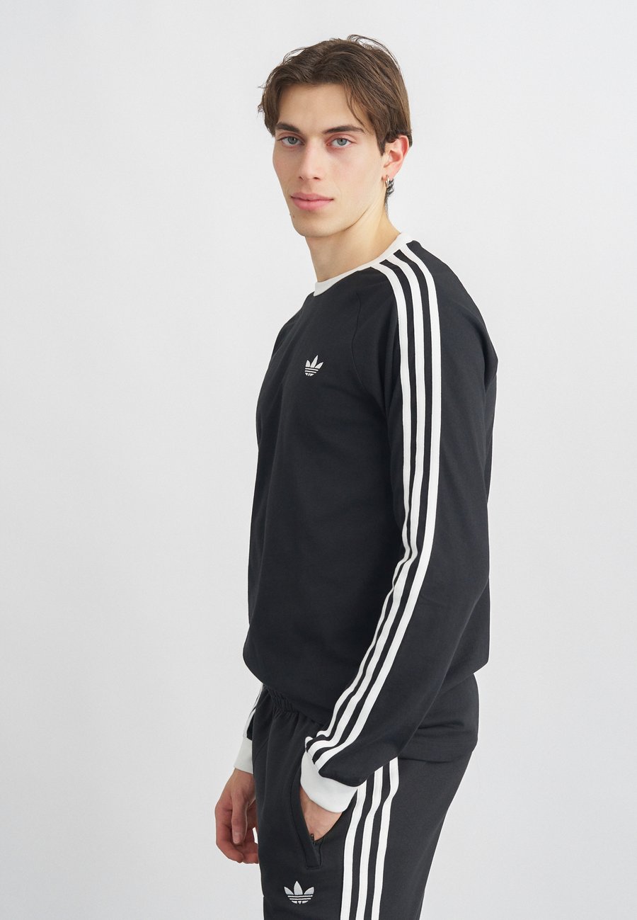 Топ Adidas Originals STRIPES TEE, Black
Топ Adidas Originals STRIPES TEE, Black