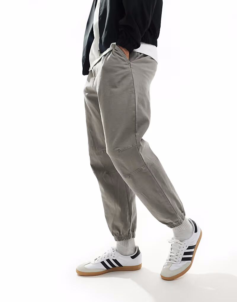 Брюки-галифе Pull&Bear серого цвета с манжетами
Брюки-галифе Pull&Bear серого цвета с манжетами