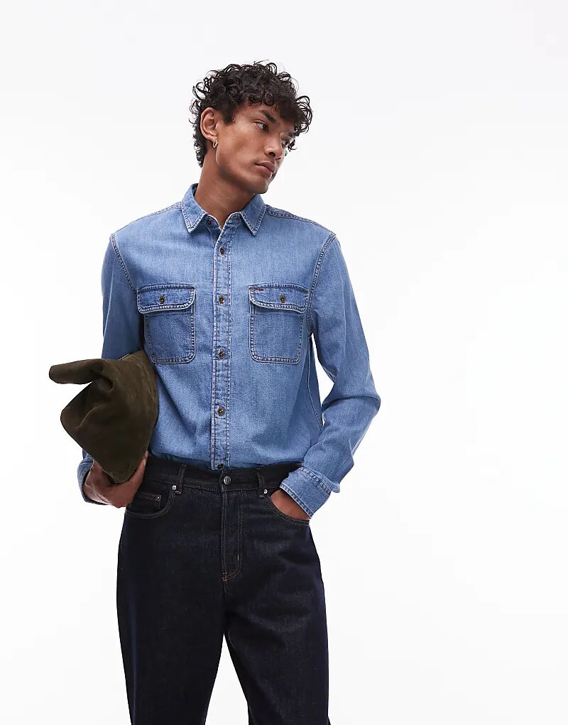 Рубашка Tommy Jeans из денима средней степени стертости
Рубашка Tommy Jeans из денима средней степени стертости