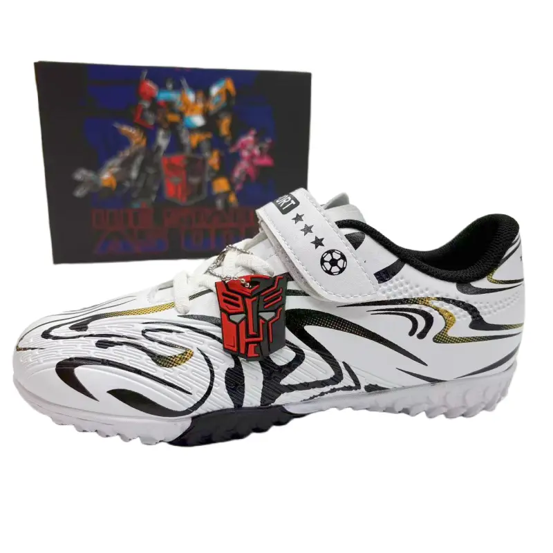 Детские футбольные бутсы Anti Kick Low Top TRANSFORMERS, черный/синий
Детские футбольные бутсы Anti Kick Low Top TRANSFORMERS, черный/синий