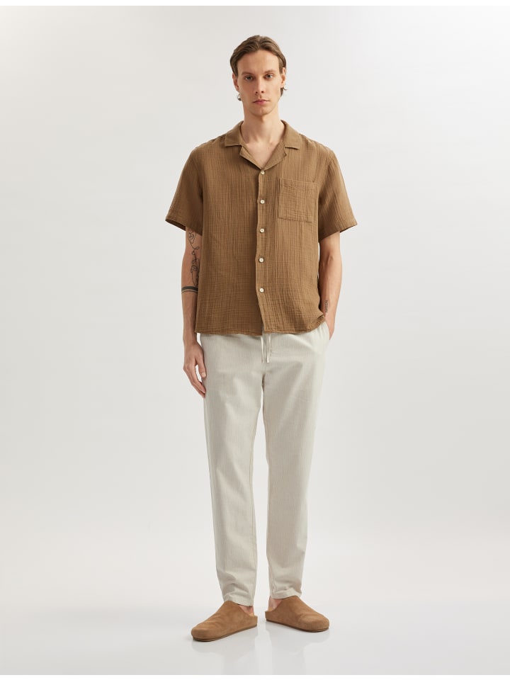 Тканевые брюки KOTON
Тканевые брюки KOTON